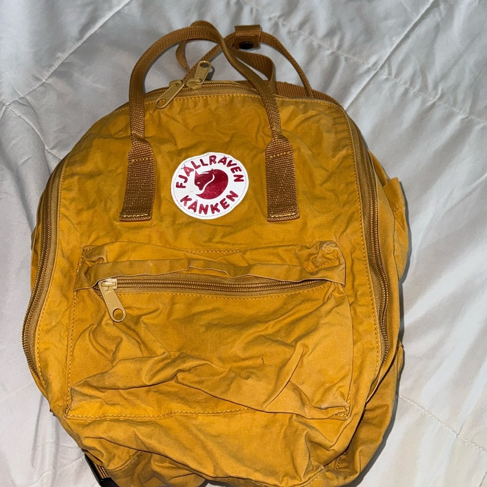 fjallraven kanken backpack in yellow